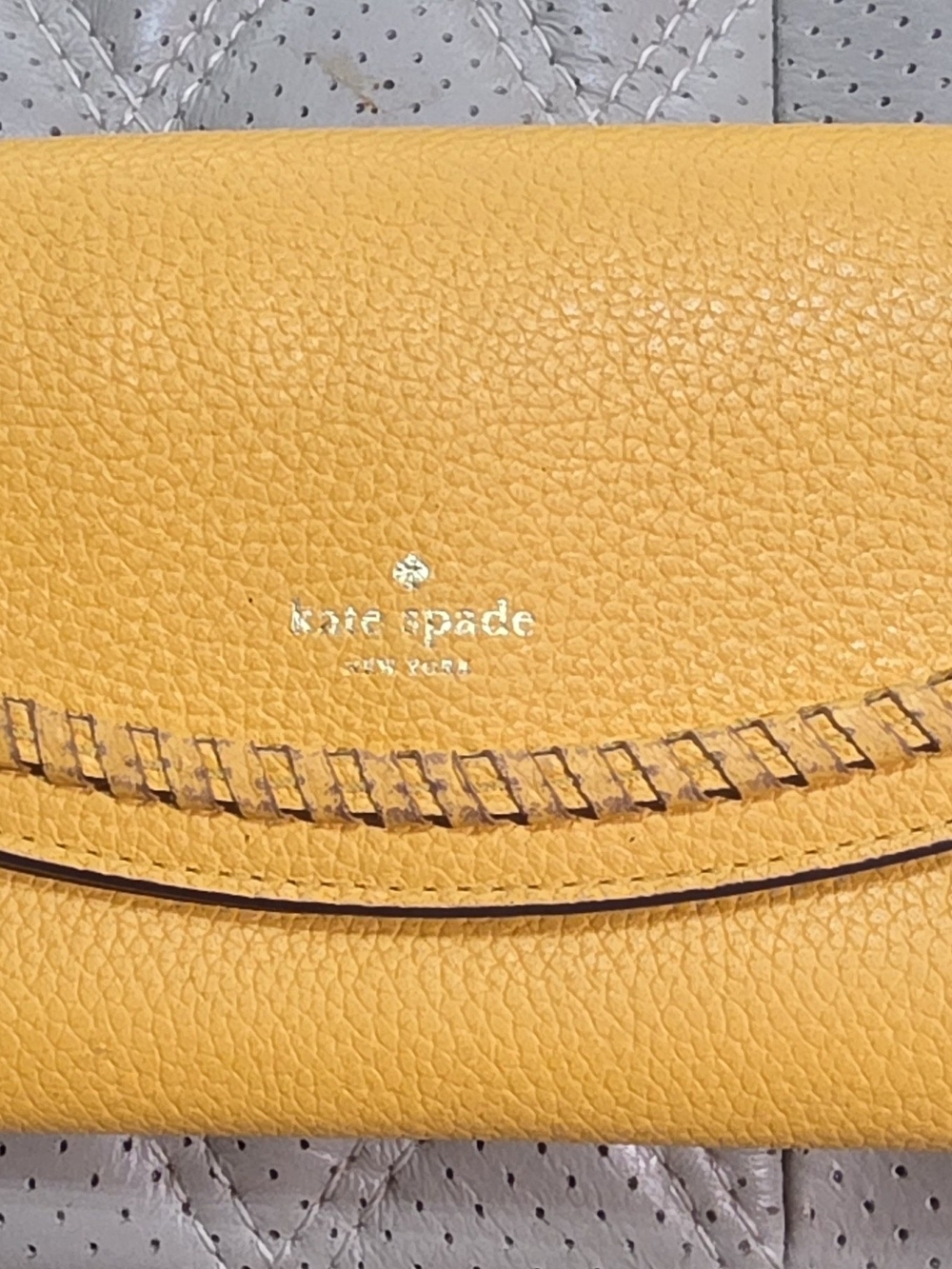 kate spade Yellow Pebbled Leather Flap Wallet Clutch